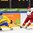 HELSINKI, FINLAND - DECEMBER 30: Denmark's Thomas Olsen #10 pulls the puck away from Sweden's Rasmus Asplund #18 during preliminary round action at the 2016 IIHF World Junior Championship. (Photo by Matt Zambonin/HHOF-IIHF Images)

